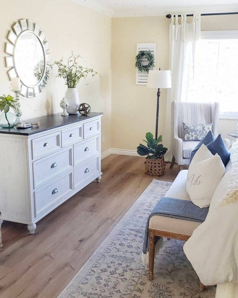 Sculpted Bedroom Baseboard with a Light Wood Floor