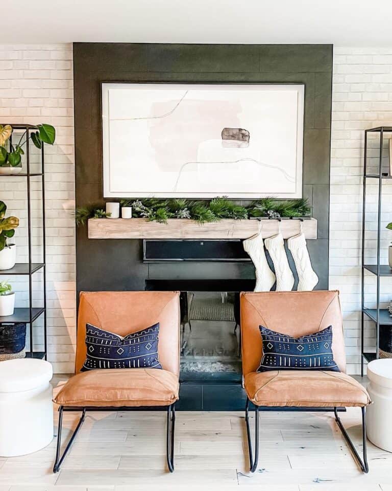 White Wall Art Decor on a Black Fireplace
