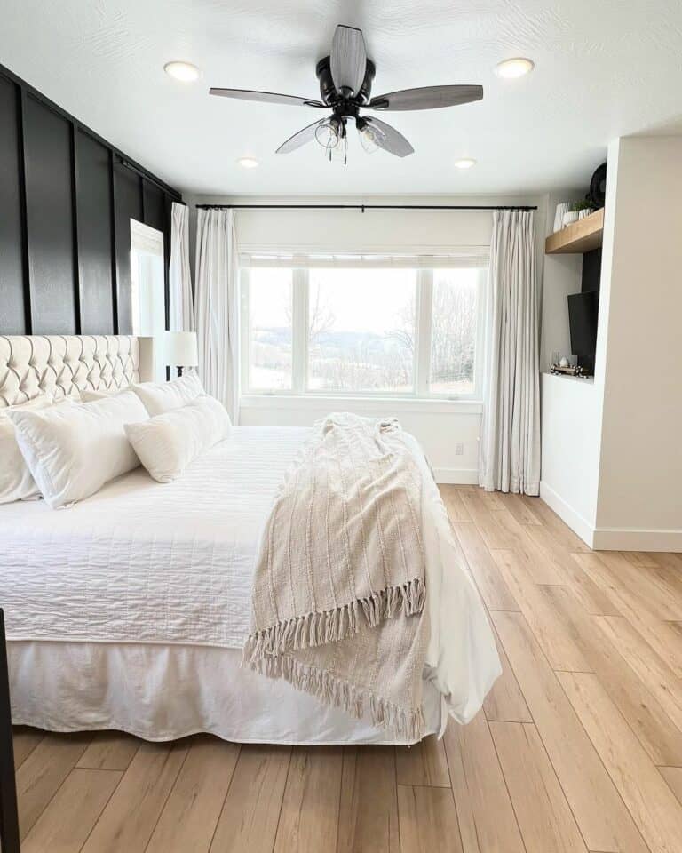 Farmhouse Bedroom With Wooden Floor