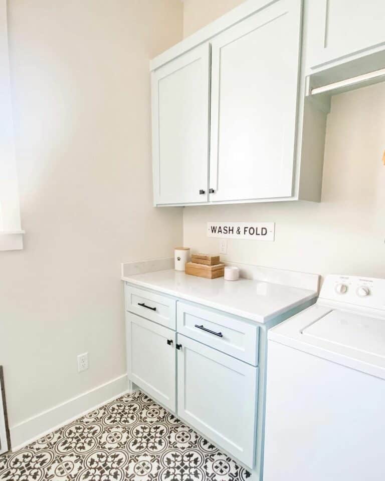 Modern Laundry Room With Monochrome Floor Tiles