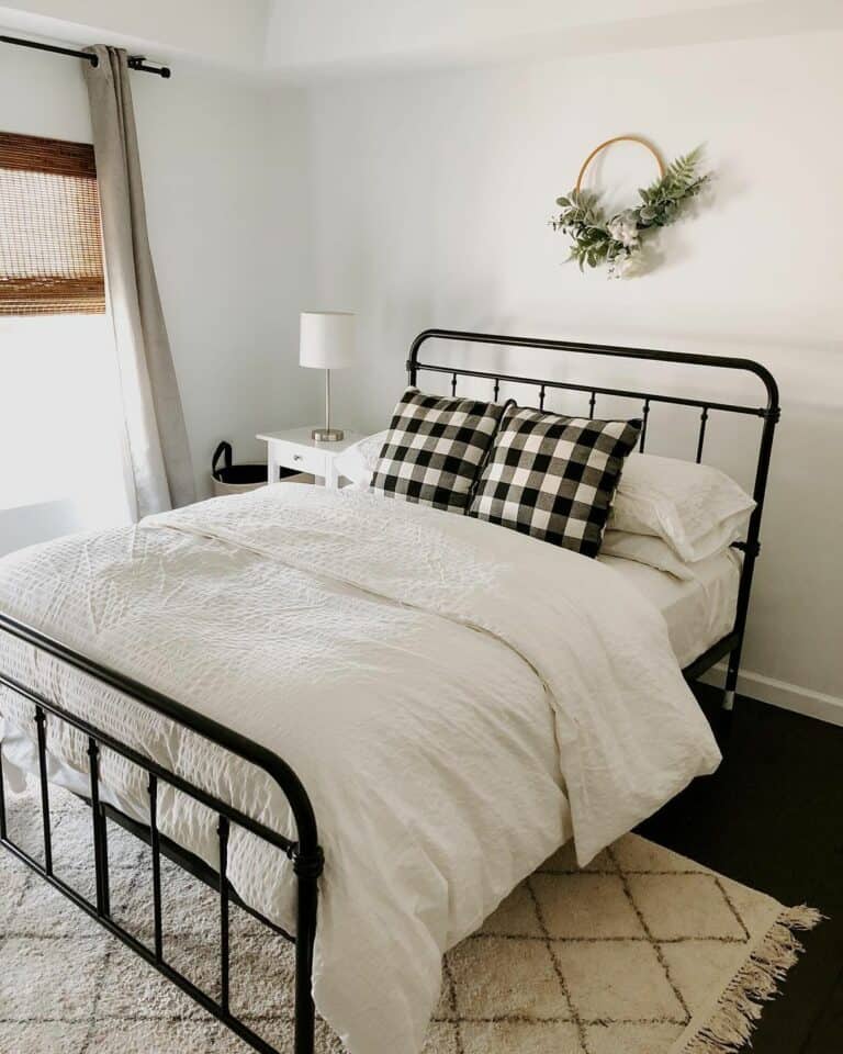 Buffalo Check Pillows Under a Delicate Spring Wreath