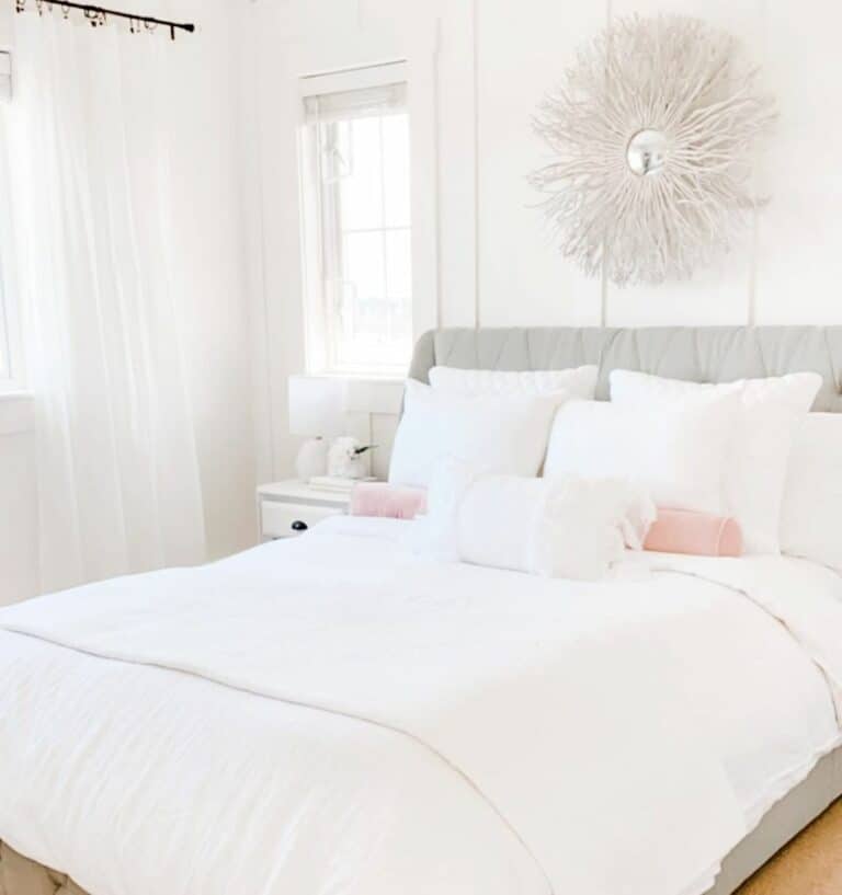 Pink Bolster and Sheer Curtains in White Bedroom