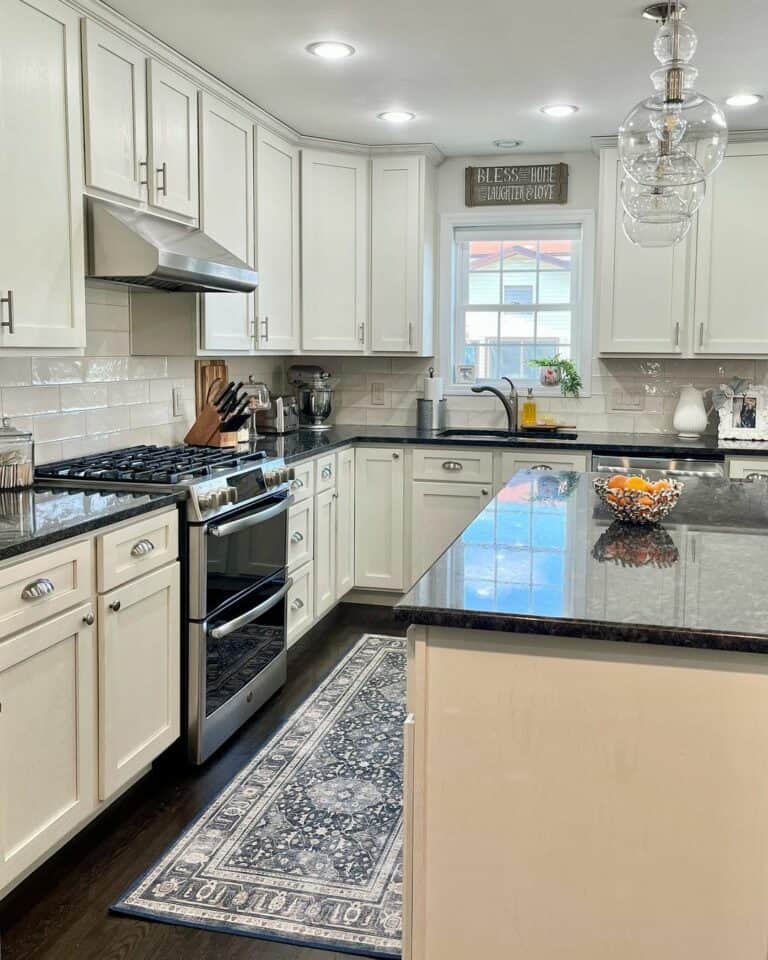 Off-white Kitchen With Ceiling Pot Lights