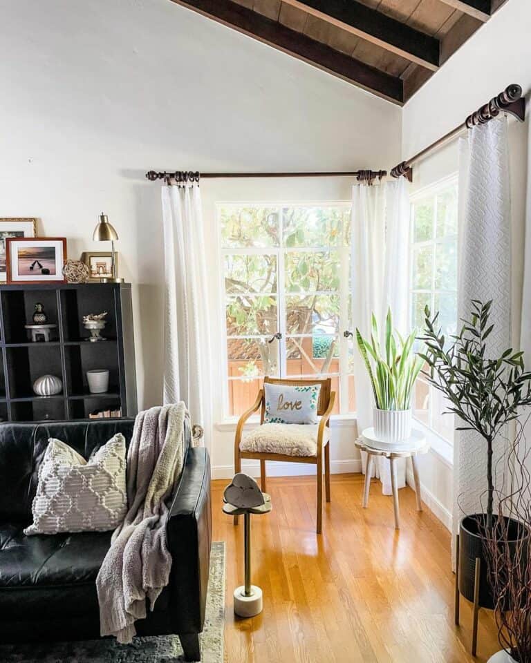 Living Room With White Wavy Patterned Drapes