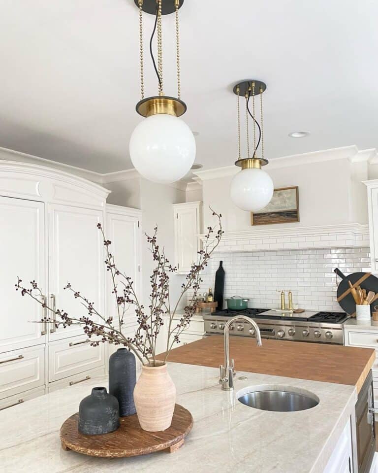 White Farmhouse Kitchen with Quartzite and Butcher Block Kitchen Island