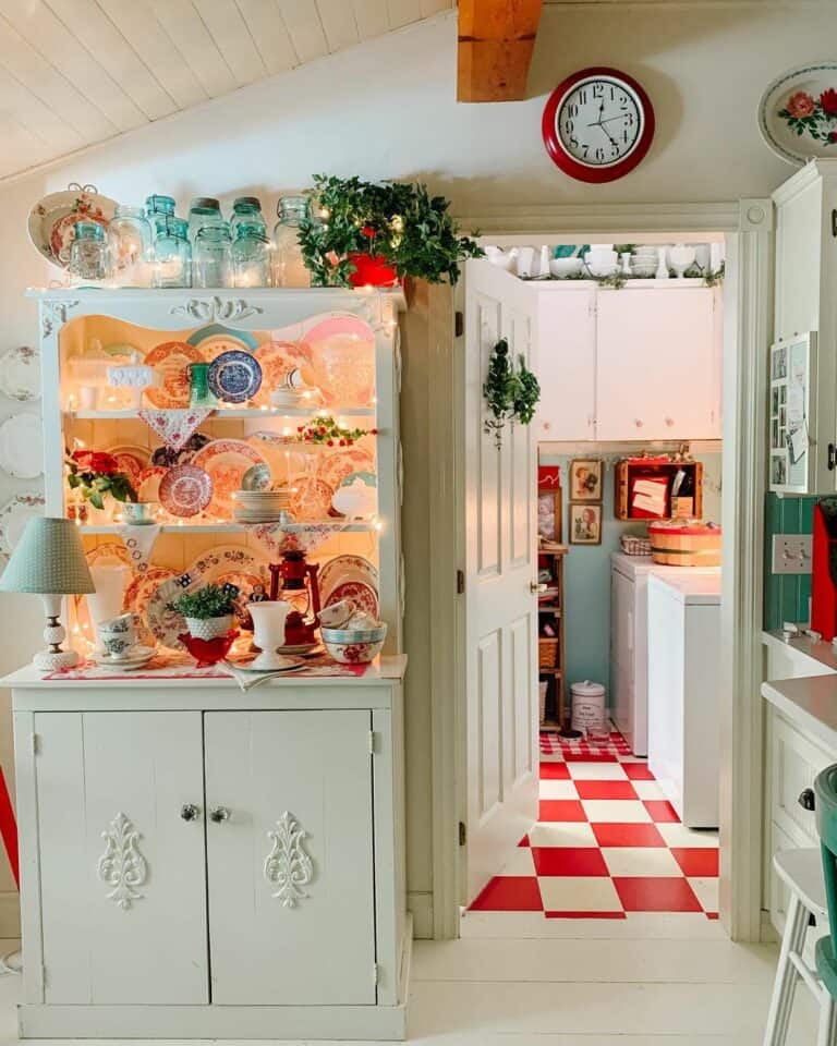 Laundry Room With Red and White Tile Flooring