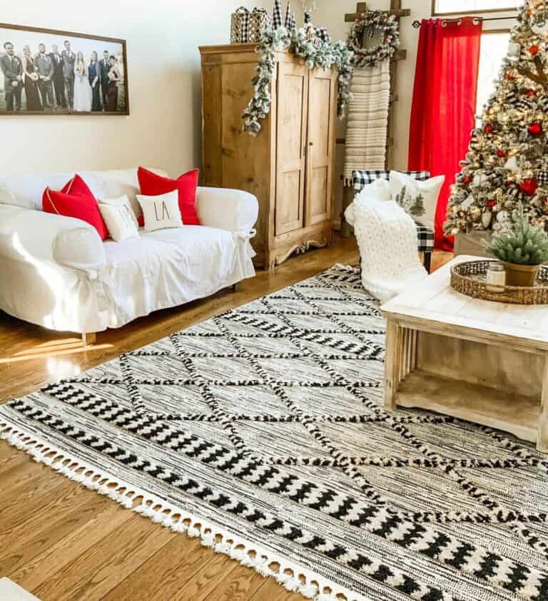 Rustic Farmhouse Living Room With Red Embellishments