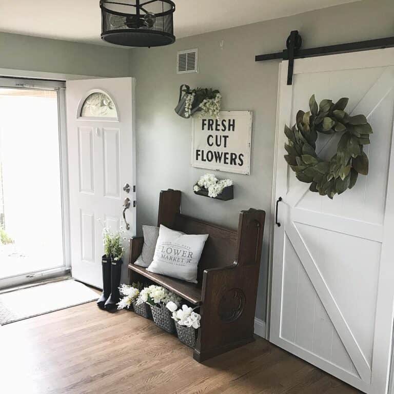 Sage Walls and Dark Wood Entryway