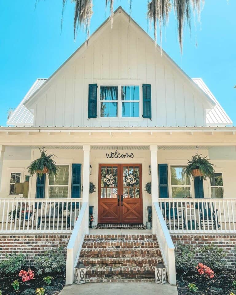 White Cottage With Red Brick Front Steps