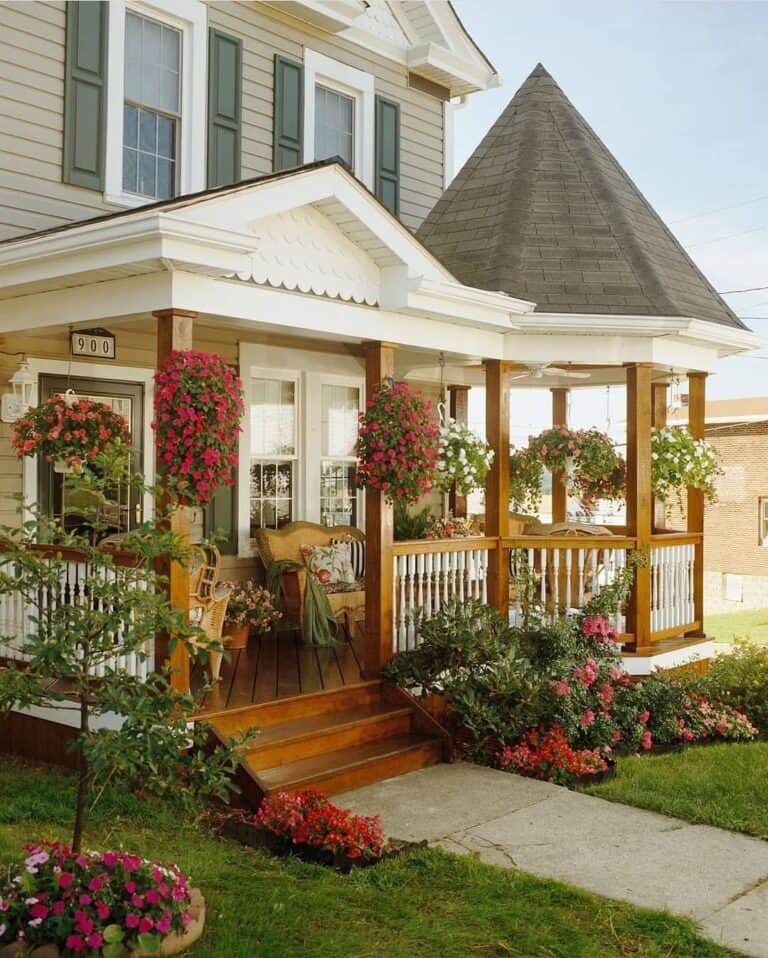 Front Porch Featuring Turret and Wooden Front Steps