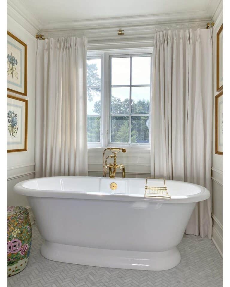 Large White Tub on a Grey Herringbone Tile