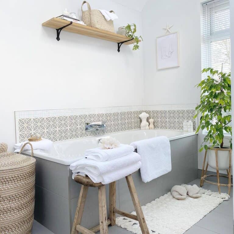 Grey Tub with a Grey Tile Floor