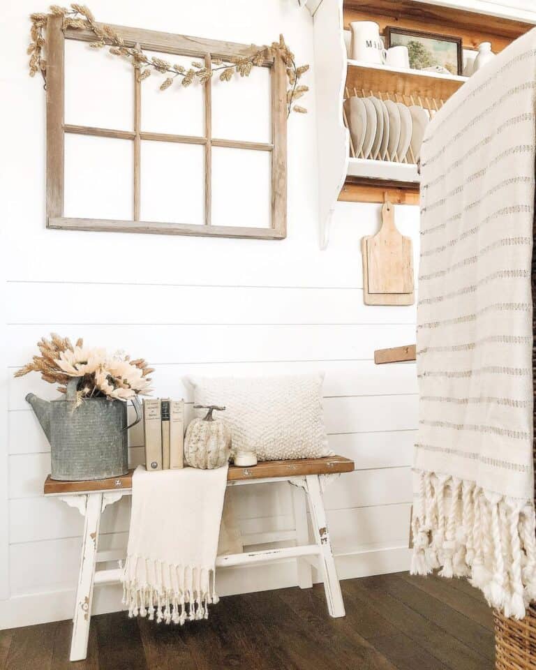 Wood Window Frame Decor Above a Rustic Bench