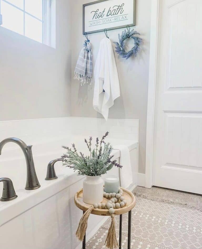 Alcove Bathtub Accessorized With Farmhouse Wall Décor