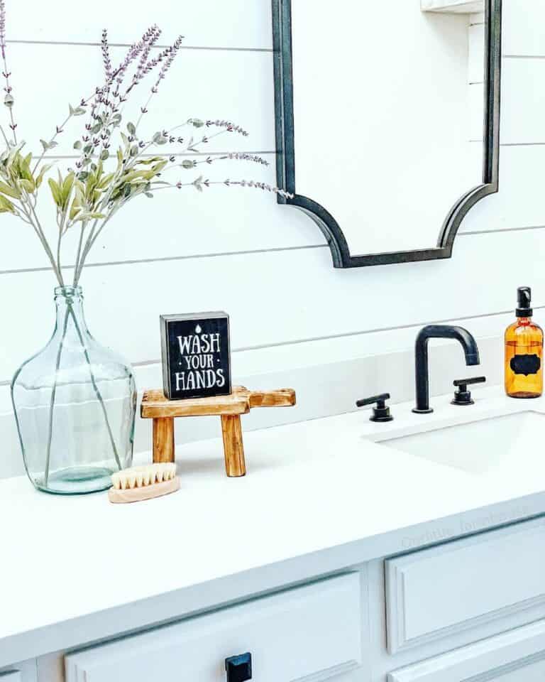 Farmhouse Bathroom Features White Vanity