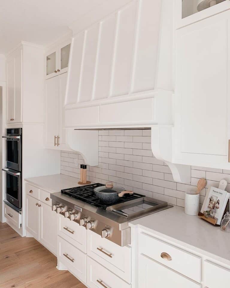 Stainless Steel Stove with White Range Hood