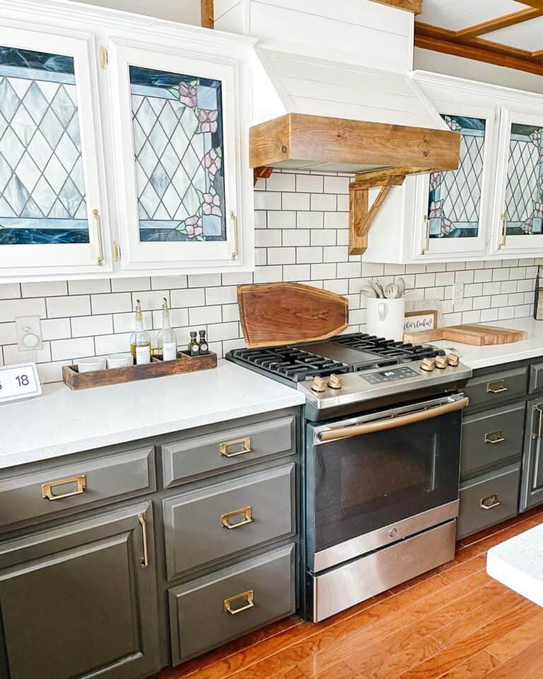 Gray Kitchen Cabinets with Brass Pulls