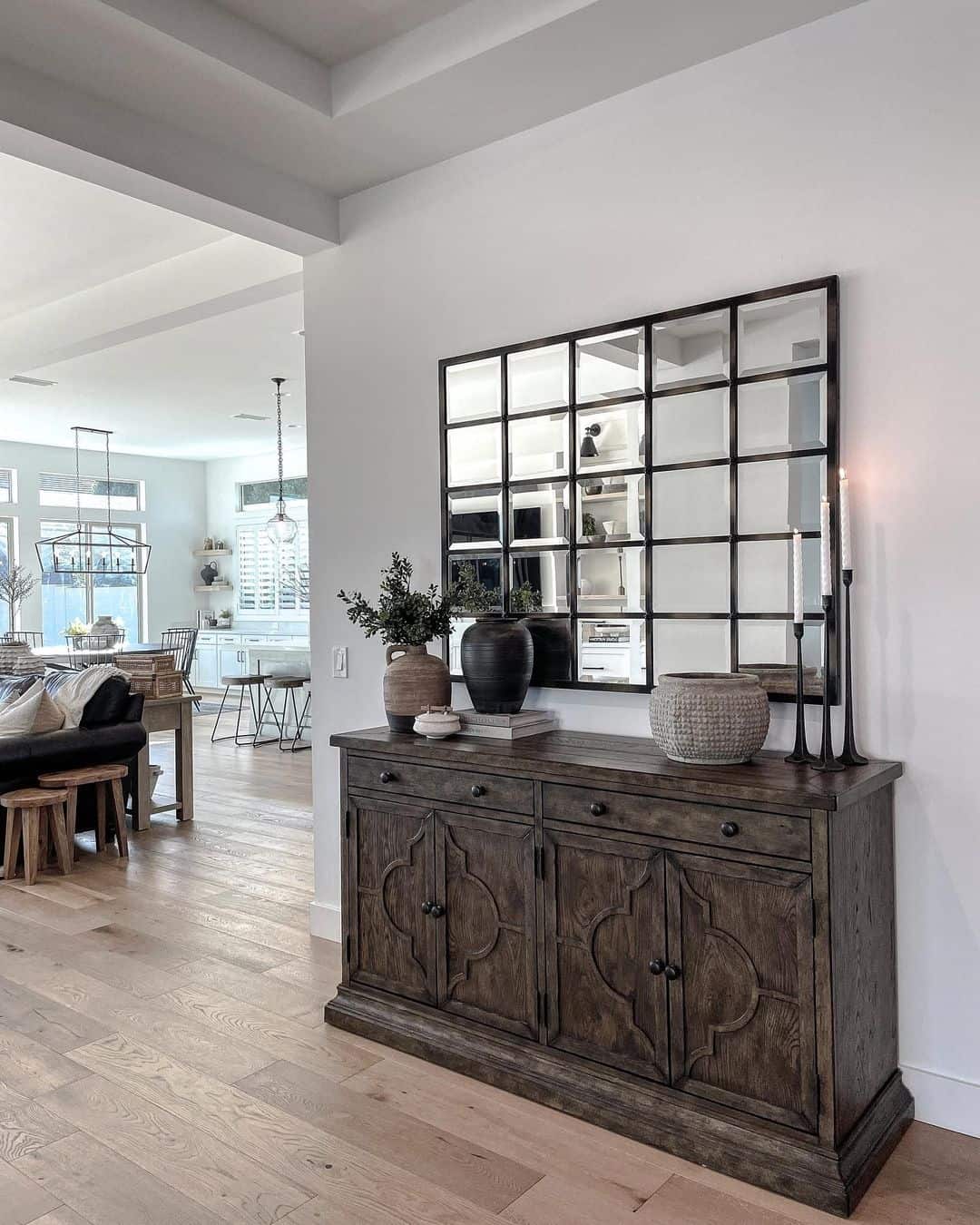 Large Stunning Mirror With Black Grids Mounted to Wall