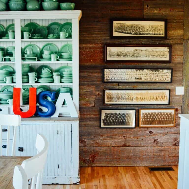 Dining Room With Antique Wood-framed Photo Display