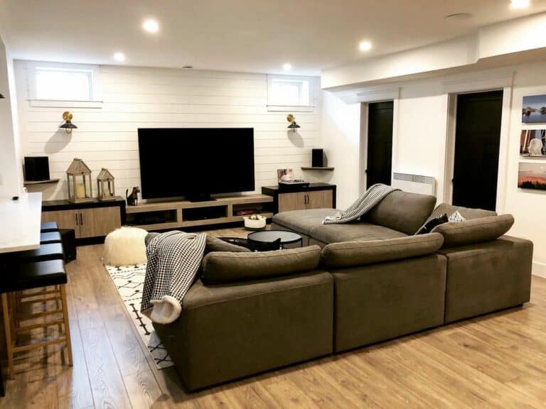 TV Room With Recessed Lighting and Surround Speakers