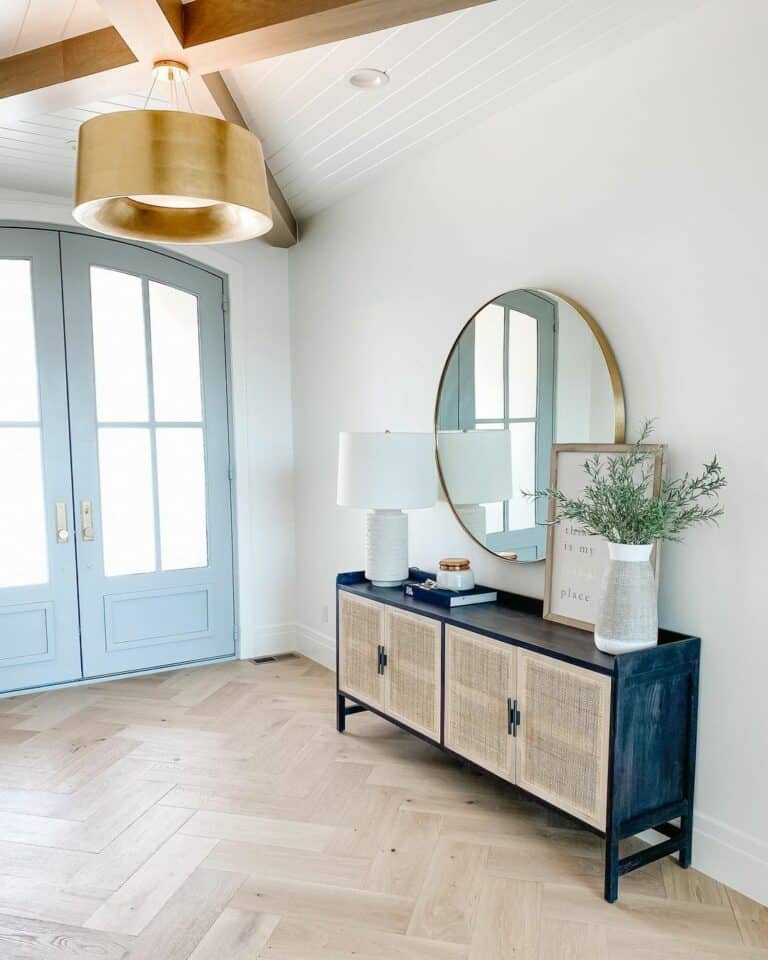 Farmhouse Entry With Exposed Ceiling Beams and Can Lighting