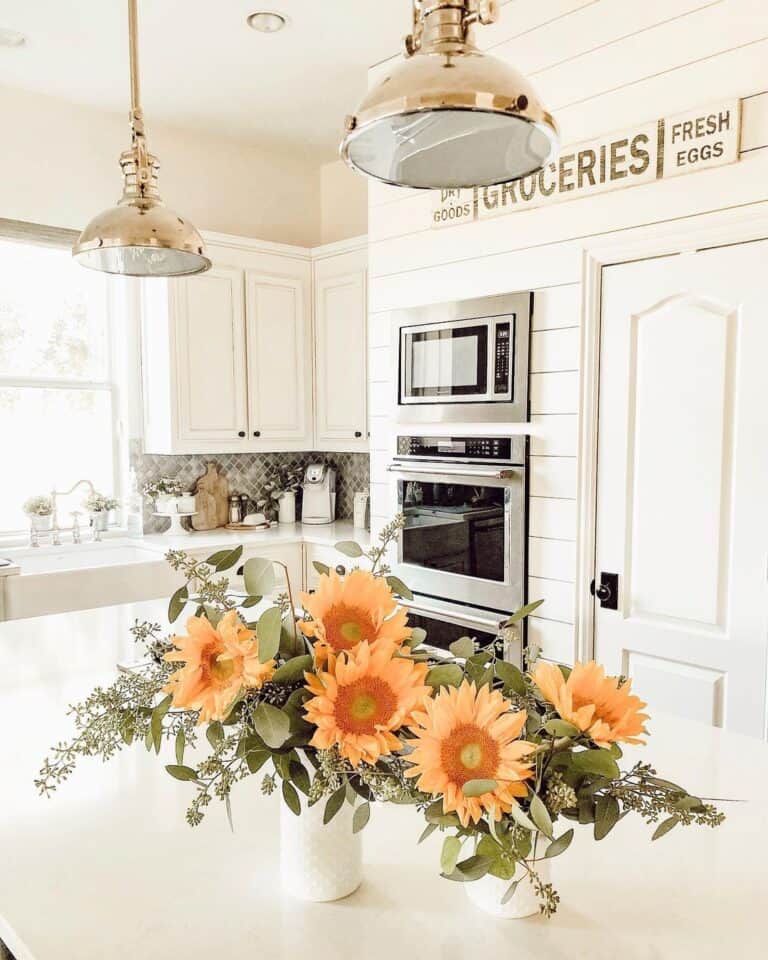 Sunflower Kitchen Décor Beneath Vintage Pendants