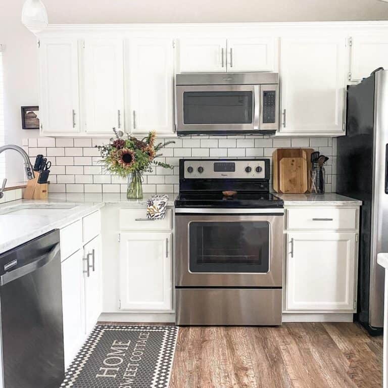 Stainless Steel Appliances in Farmhouse Kitchen