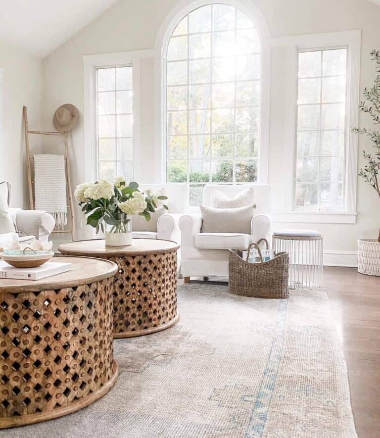 Two Round Coffee Tables in Well-Lit Room