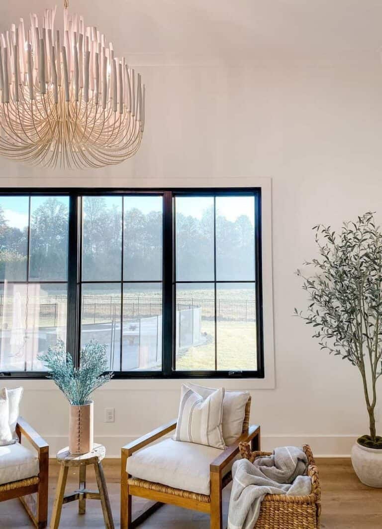 Minimalist Seating Area and Black Windows With Decorative Grid Patterns