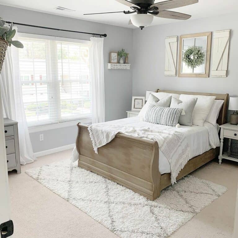 Light Grey Bolster on a Wooden Sleigh Bed