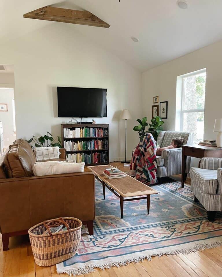 Playful Living Room With Rustic Leather Couch
