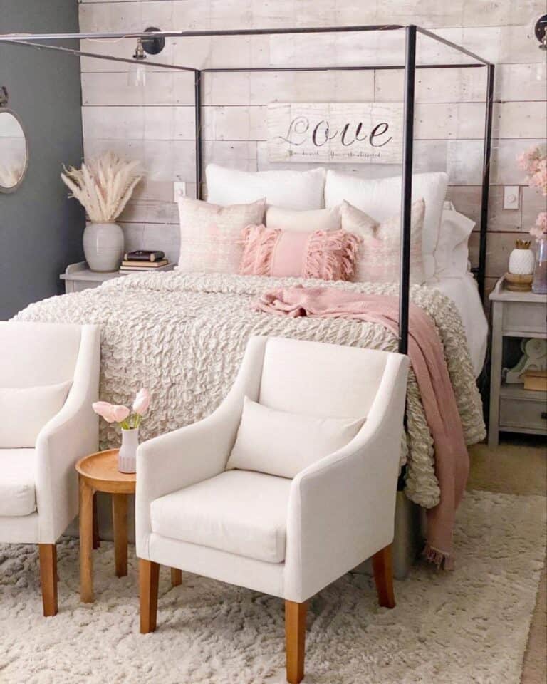 Sitting Area With White Chairs and Wood End Table