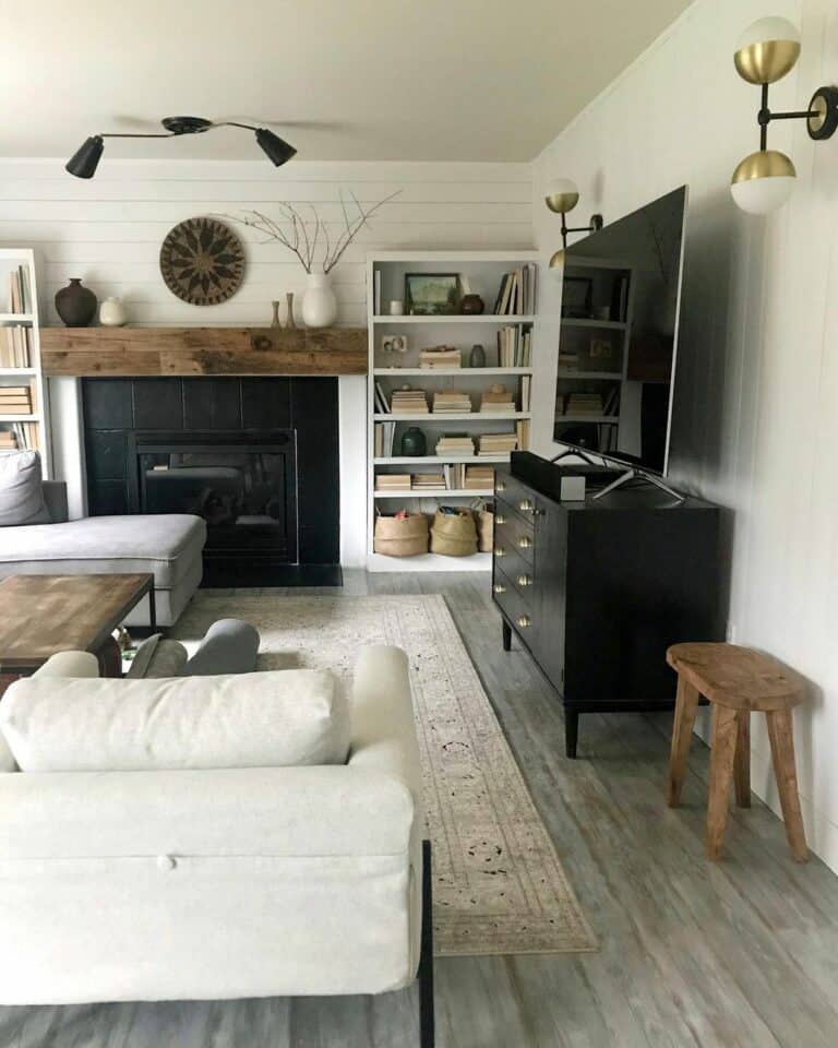 Living Room with Black and Gold Light Fixtures