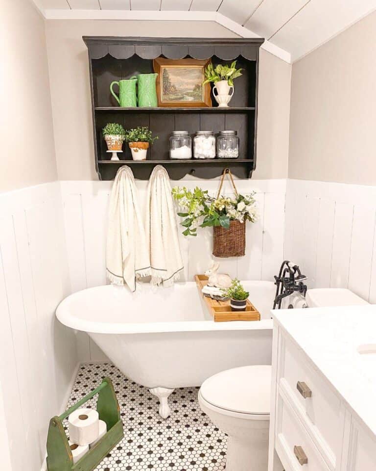 Farmhouse Bathroom with White Roll Top Bathtub