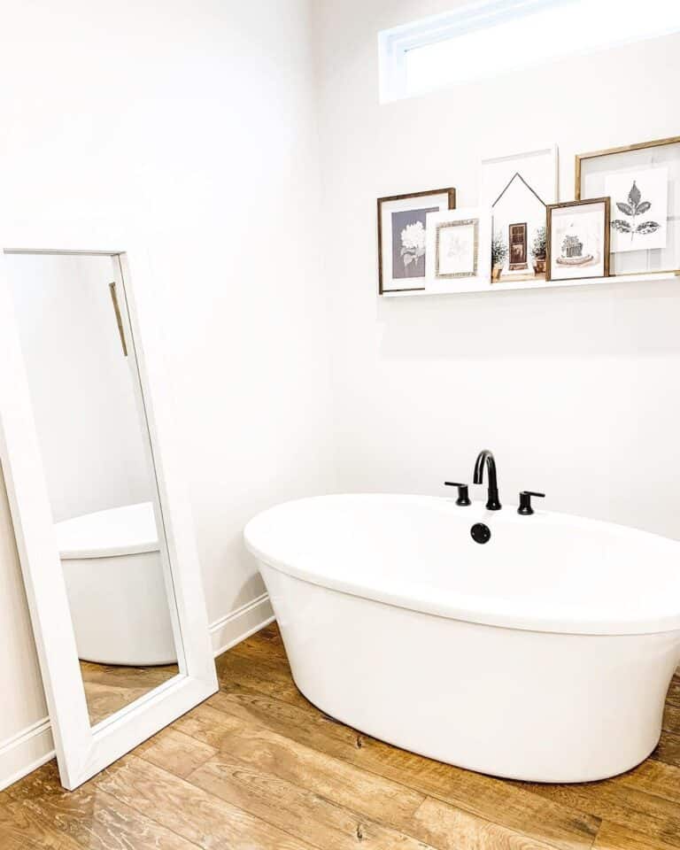 Freestanding Oval Bathtub with Black Faucet