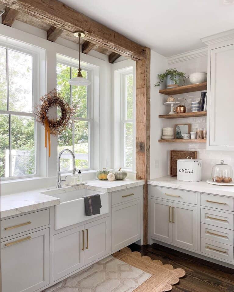 Off-White Cabinets with Bronze Kitchen Handles