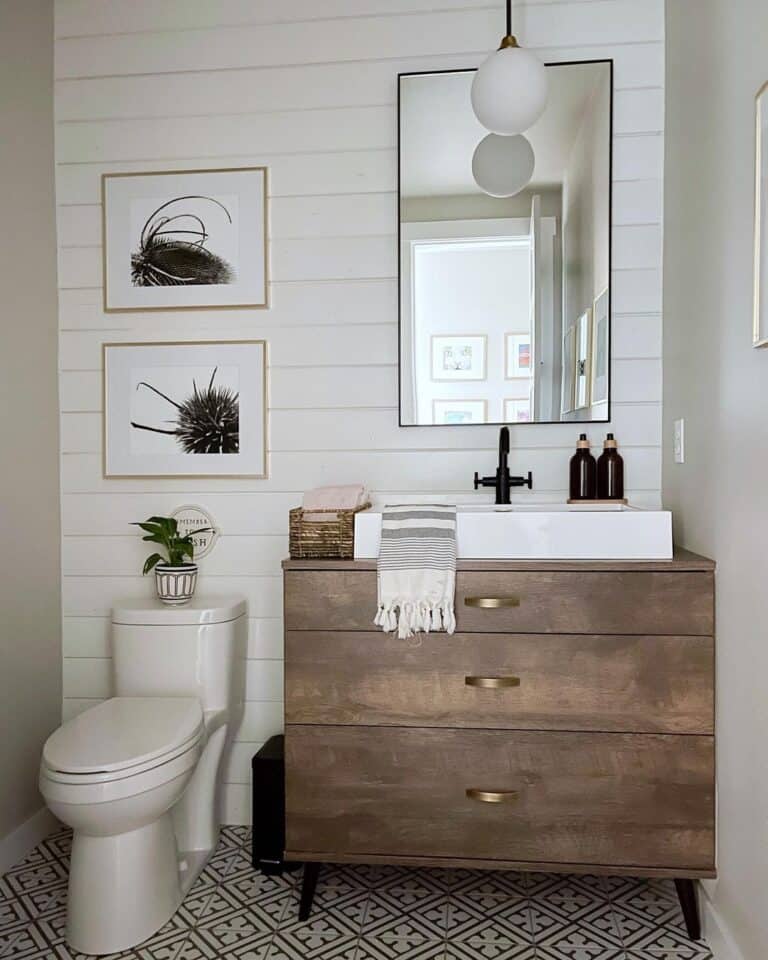 Wood Dresser with Brass Drawer Pulls in Bathroom