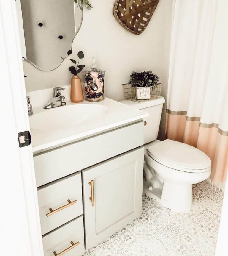 Large Brass Drawer Pulls on Light Grey Bathroom Cabinet