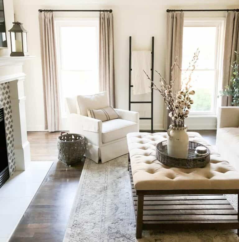 Cute Beige Living Room With Tufted Ottoman