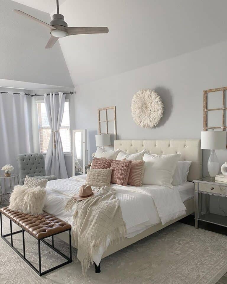 Modern White Farmhouse Décor Above a Tufted Headboard