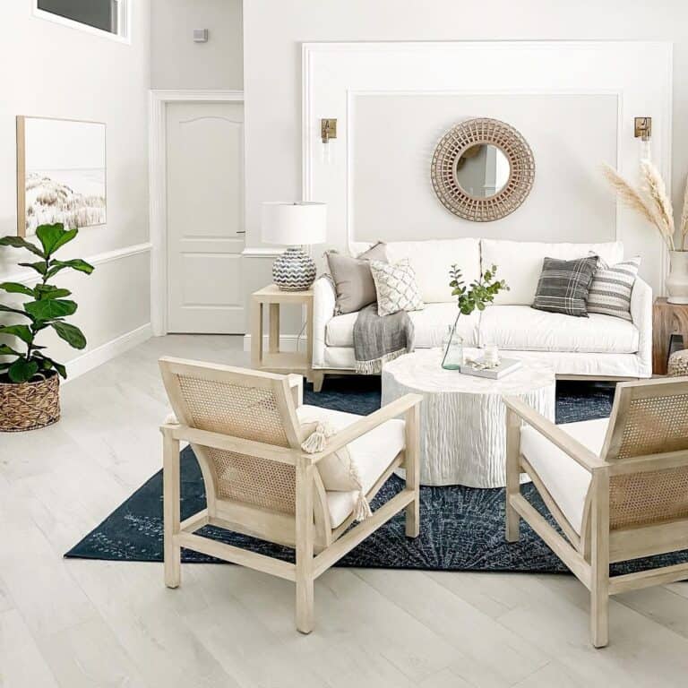 Farmhouse Wall Ideas Include a Gold Sun Mirror on a White Wall