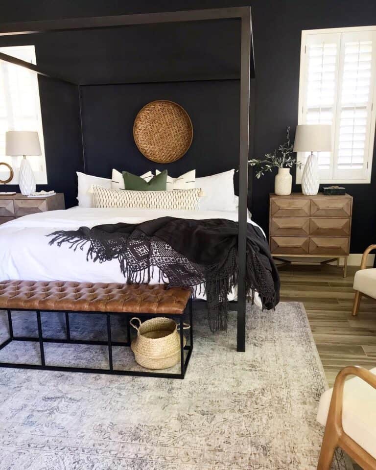 A Wicker Basket on a Black Bedroom Wall