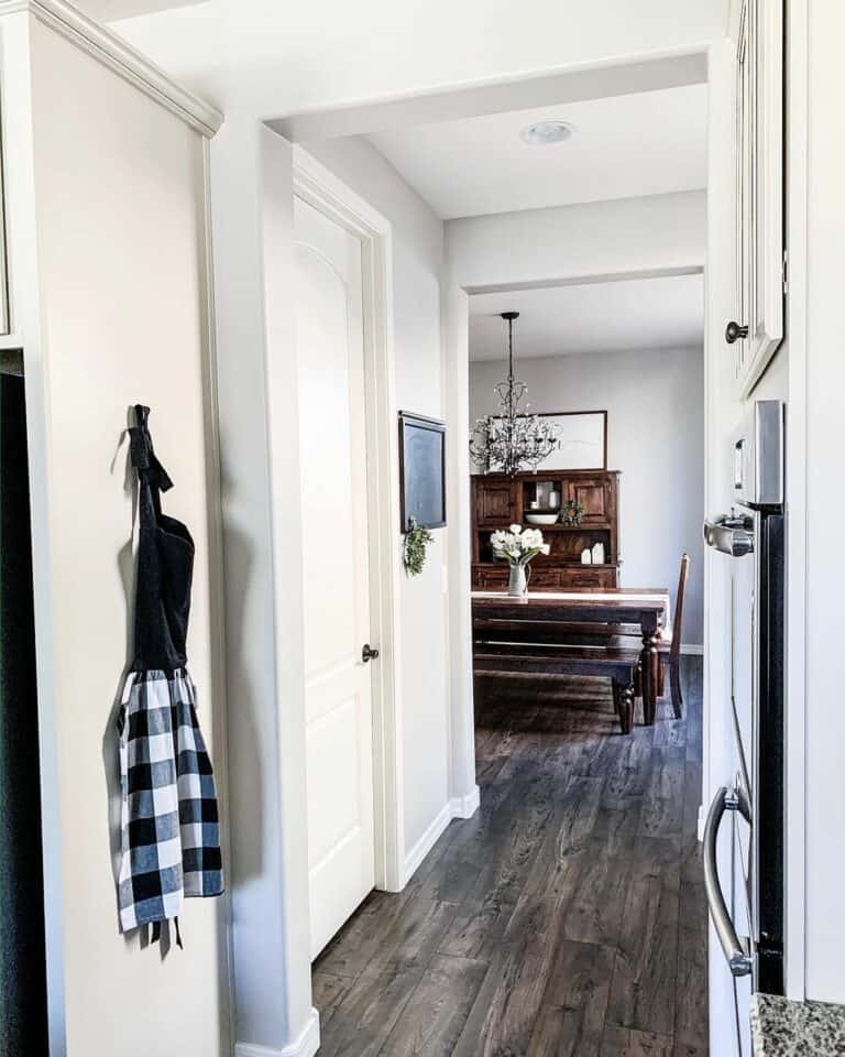Dining Room Hallway with White Recessed Lighting
