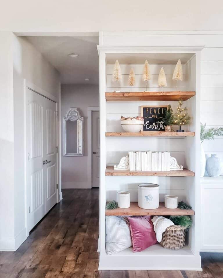 Recessed Light Hallway with Stained Wood Flooring