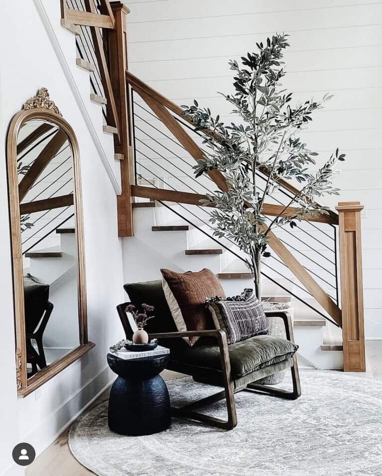 Modern Armchair Beside Tree and Mirror
