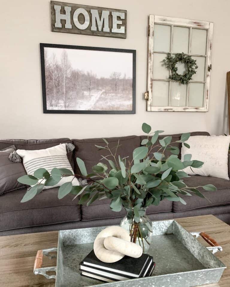 White Wood Window Frame Above a Dark Grey Sofa