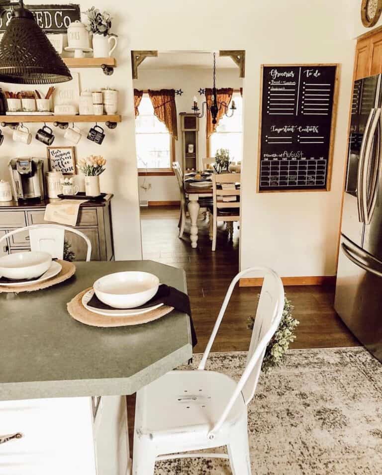 White Metal Chairs Beneath Gray Island Countertop