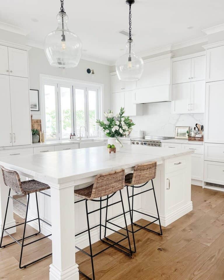 Large White Kitchen with Glass Pendant Lighting