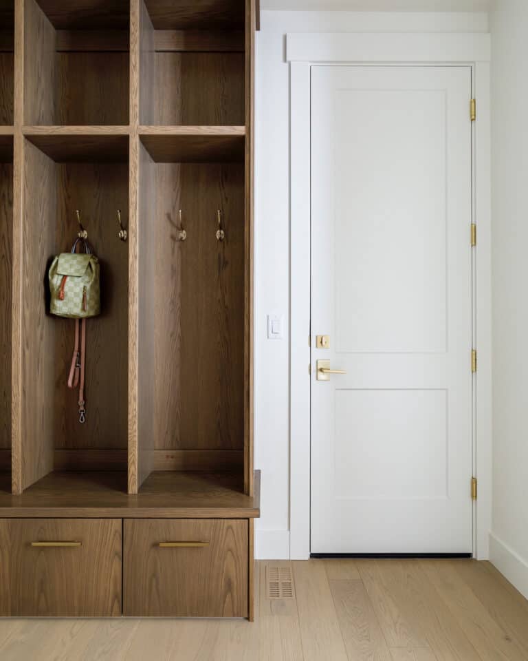 Stained Wood Mudroom Lockers with Brass Hardware