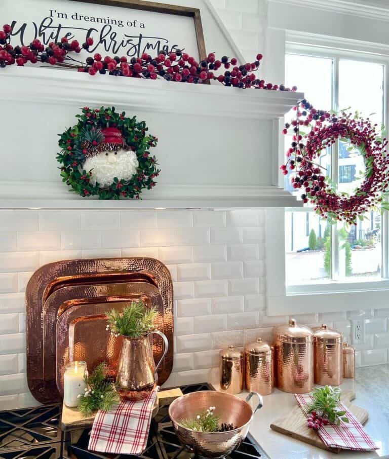 Shiny Copper Accessories Against White Backsplash